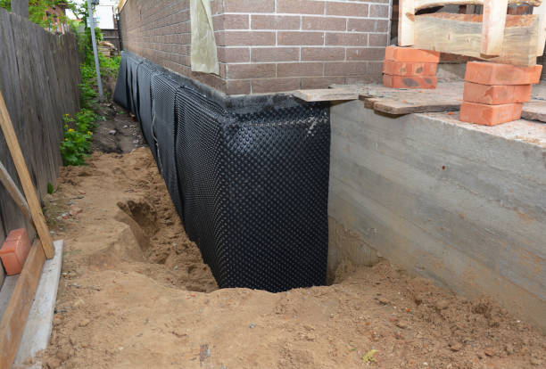SJ Waterproofing Pros technician performing targeted Waterproofing assessment in Parkville, PA